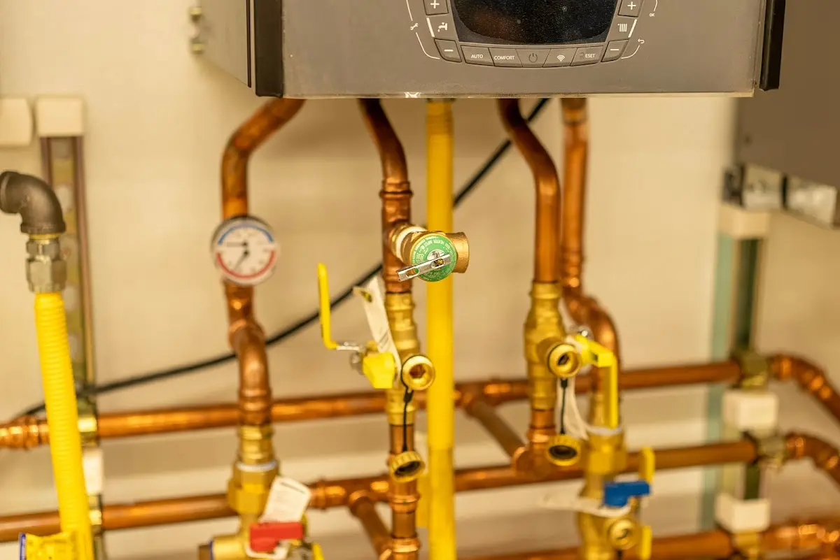 Licensed technician providing Water Heater Installation for a homeowner in Vassar